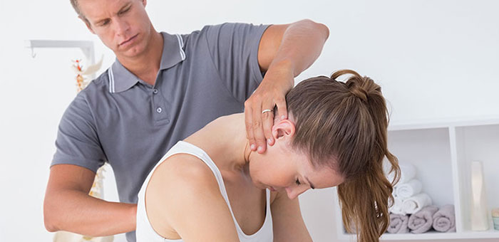 Woman receiving chiropractic adjustment from a Brentwood chiropractor