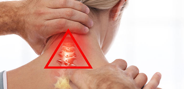 Brentwood chiropractor adjusting woman's neck for whiplash